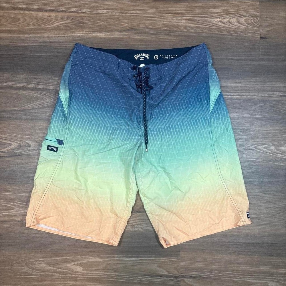 Billabong board shorts with gradient from blue to orange